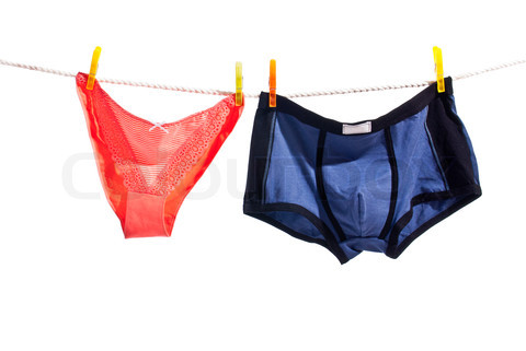 Red woman panties and blue man underwear on clothesline isolated
